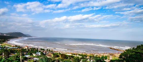 Rushikonda beach in Visakhapatnam, Andhra Pradesh, on the coast of Bay of Bengal has golden sands with clear blue waters and greenery all around. Pic: Flickr