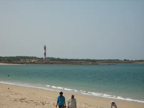 Shivrajpur - the pristine beach near the Shivrajpur village stretches between a lighthouse and a rocky shoreline in Dwarka, Gujarat. Pic: Flickr 30 stades