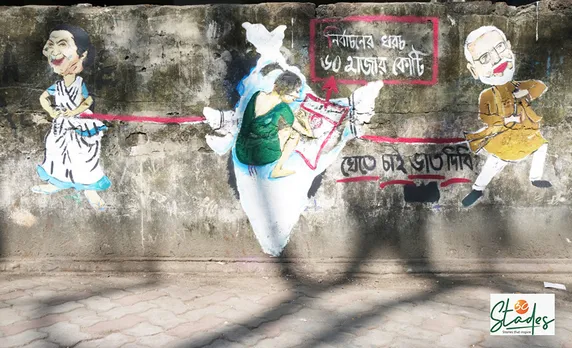  Graffiti made by Suman Mitra with the help of street Children, who said: "Election expense is Rs 60,000 crore….want to eat some rice. Can they provide some food?” Pic: Soumik Kundu 30 stades