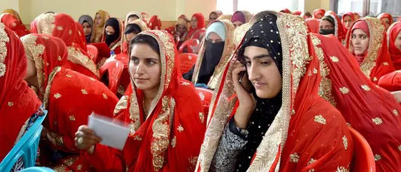  A mass marriage being conducted through NGO Aash - The Hope of Kashmir. Pic: through Aash 