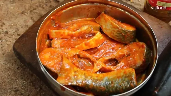 Pushparani Sarkar's Illisha Bhapa (steamed hilsa) preparation.