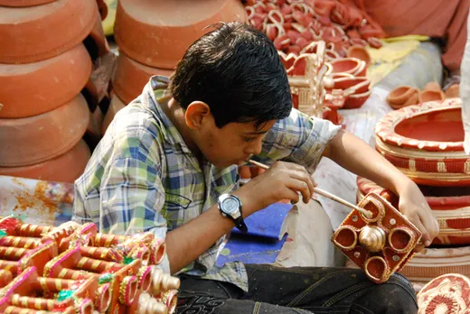 Diyas are also painted with colours and decorated for Diwali. 
