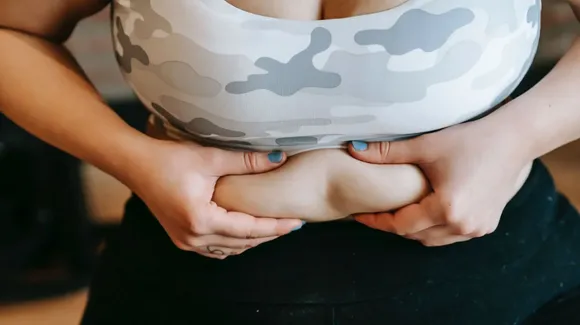 Postpartum Weight Loss: डिलीवरी के बाद कैसे करें वजन कम