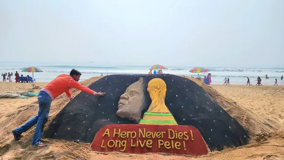 Sand artist creates Pele sculpture on Odisha beach