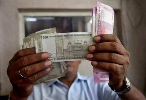 Rupee gains 9 paise to 81.29 against US dollar
