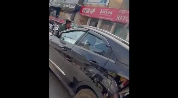 Man dragged on to bonnet of car for 1 km in road rage in Bengaluru