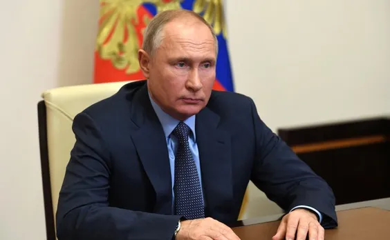 Putin signs law expanding restrictions on activities promoting LGBT