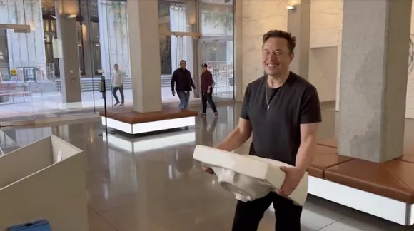 Elon Musk, Chief Twit, enters Twitter HQ carrying a 'sink'; says 'let that sink in!'