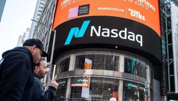 NASDAQ plunges; world shares sink after inflation driven retreat on Wall Street