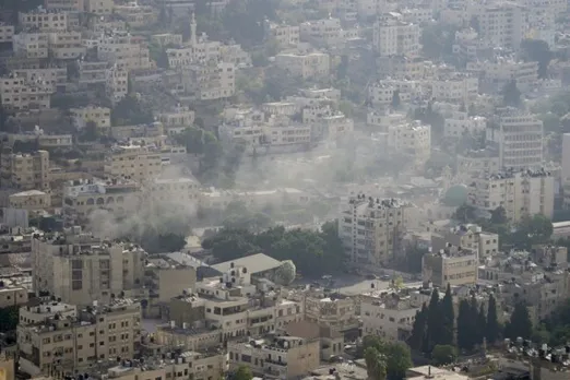Palestinians say Israel troops kill 3 in West Bank raid