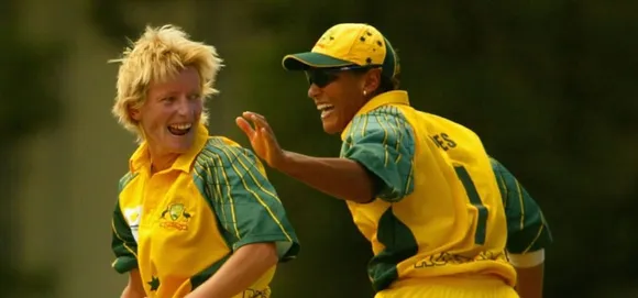 Cathryn Fitzpatrick celebrates a wicket with Melanie Jones. © Getty Images