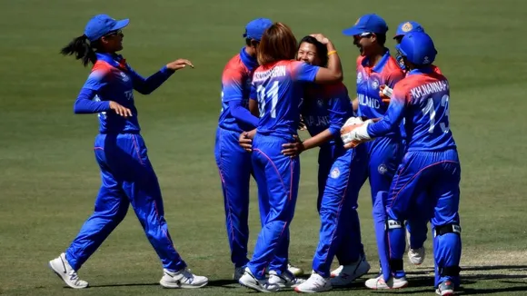 Ratanaporn Padunglerd is congratulated for taking a wicket. © ICC