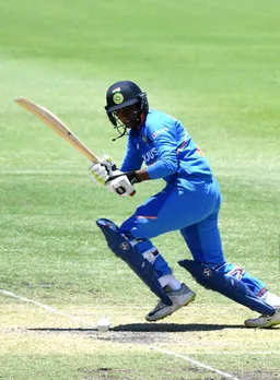 Arundhati Reddy flicks the ball to the leg-side. © Getty Images
