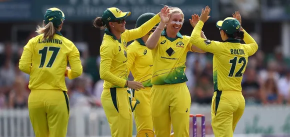 Delissa Kimmince celebrates the wicket with her teammates.