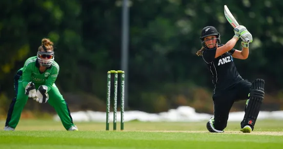 Amelia Kerr smashes one over cover in her record breaking knock. © Cricket Ireland